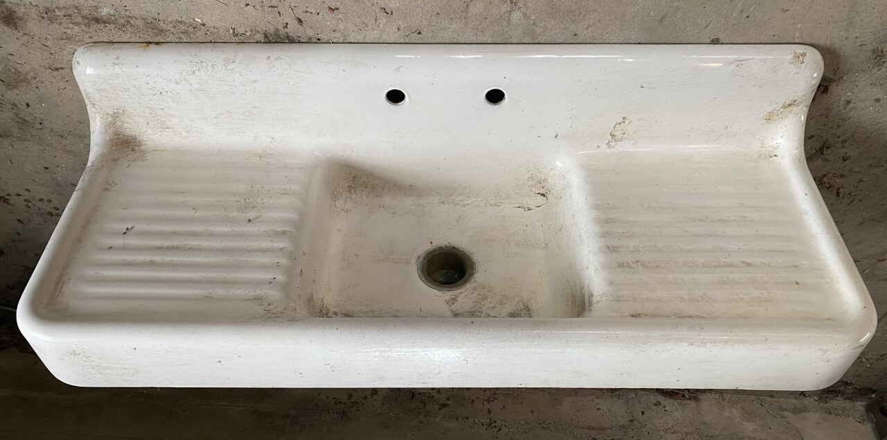 farmhouse cast iron sink in bathroom